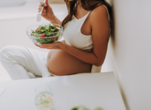 Pregnant Woman Eating Healthy Salad
